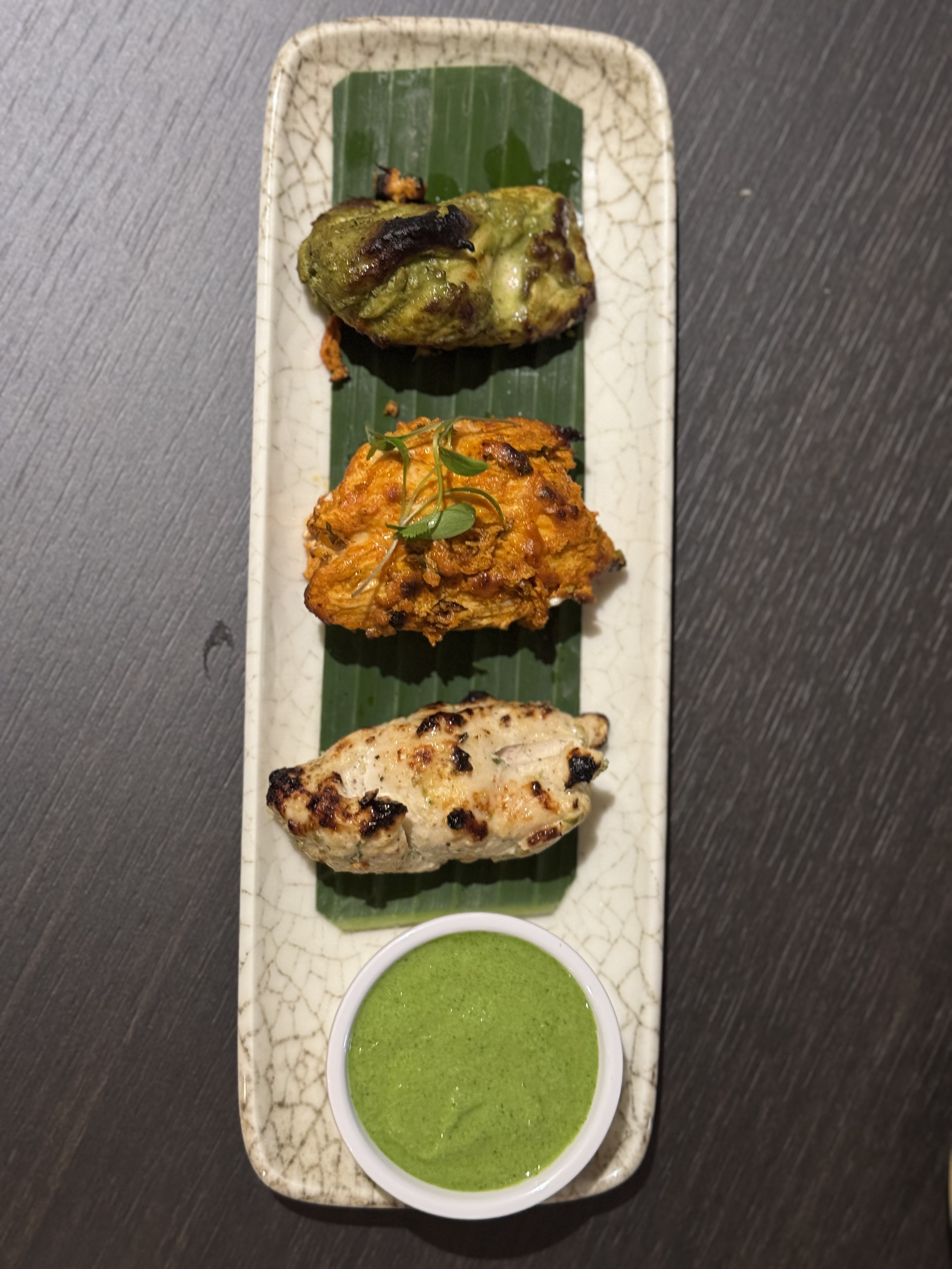 Grilled tandoori dishes plated for BaseCamp Indian Kitchen